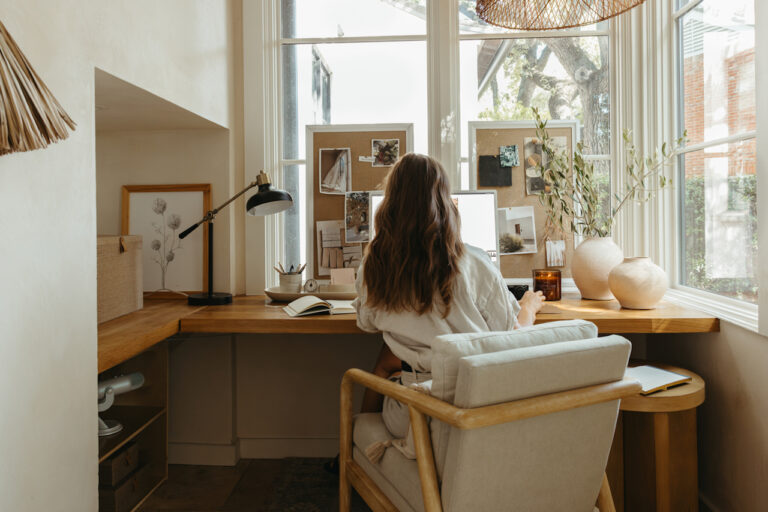 1724753108 camille styles working at desk