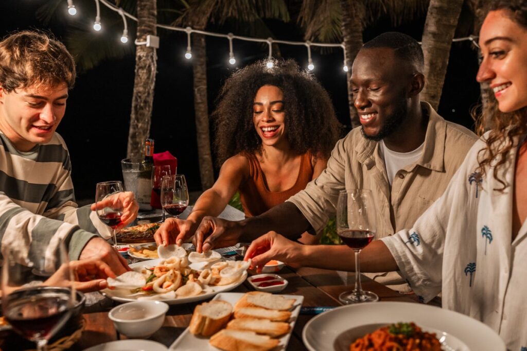 Friends dining outdoors