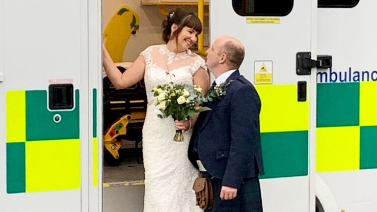 paramedics marry in front of ambulance