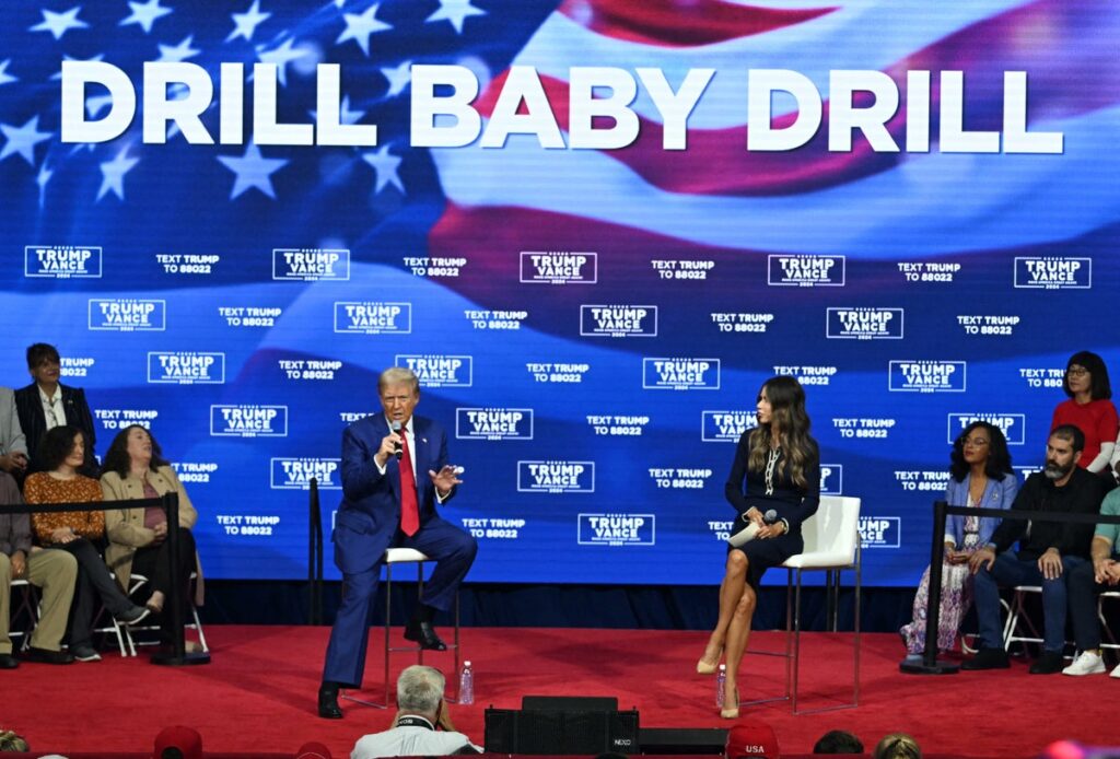 President elect Donald Trump speaks at a campaign town hall on Oct 14 2024 in Oaks Pennsylvania as moderator South Dakota Gov Kristi Noem R listens